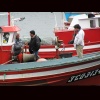 Ampliacin de Pescadores chilenos nunha embarcacin